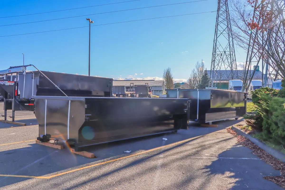 Roll-off dumpster ready for waste disposal at job site for Construction Dumpster Rental in Elmwood Park